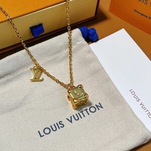 Louis Vuitton Gold LV Cube and Logo Pendant Necklace
